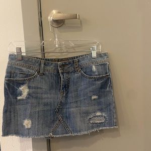 I am selling a Billabong size juniors 3 light blue faded mini jean skirt!